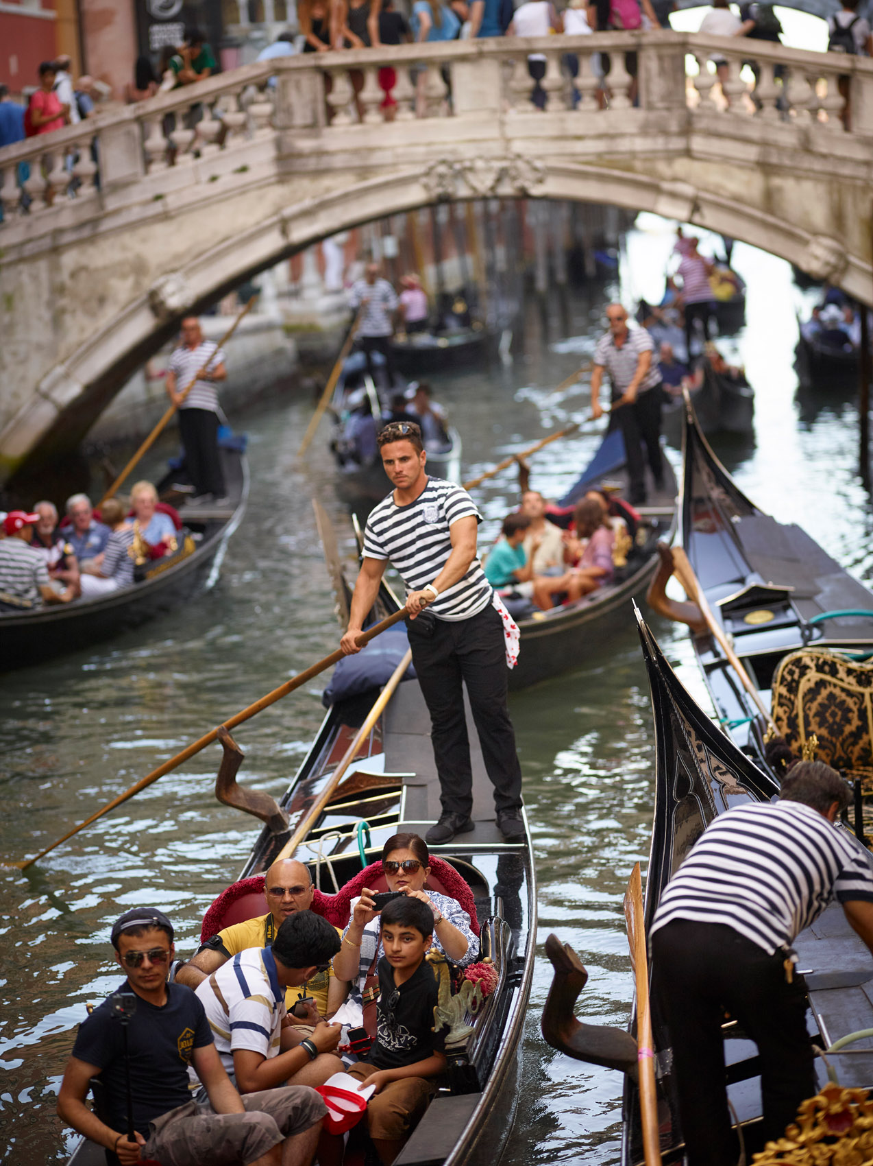Gondola traffic on the rio del Palazzo, Venice, IT.